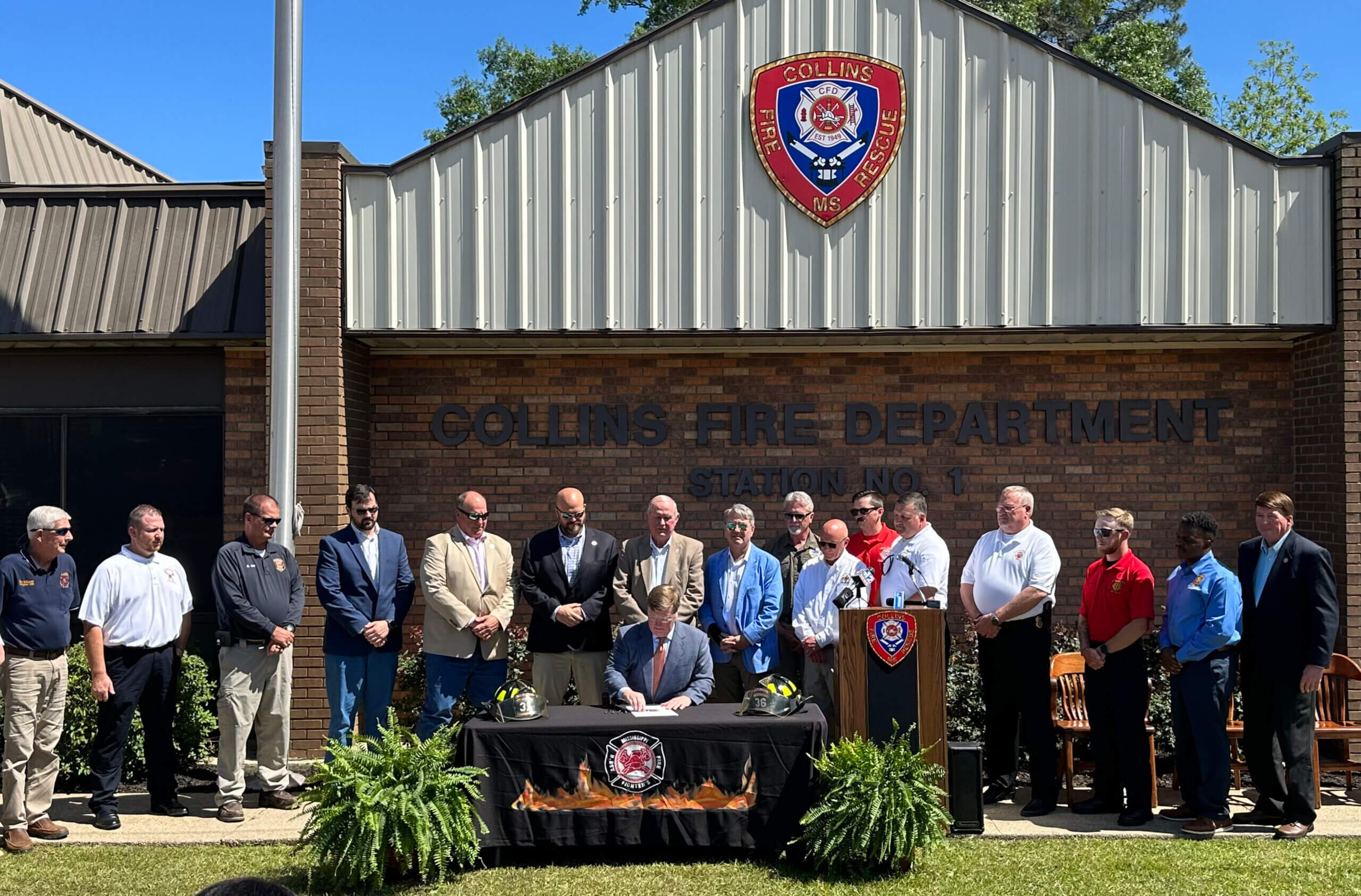 volunteer firefighter service award signing