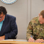 COL Gipson and Mayor Vaughan Signing PPA