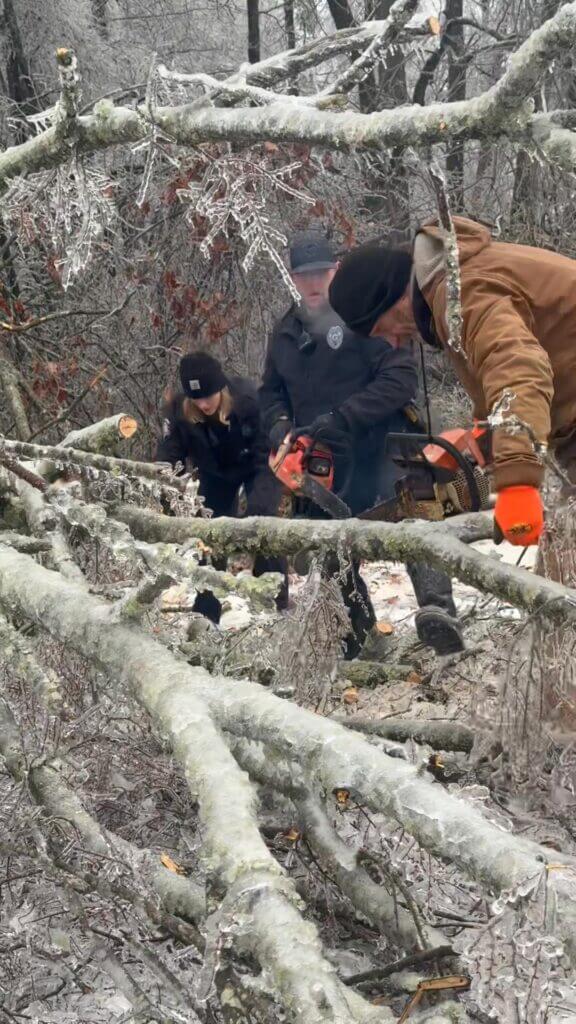 Sgt. Waters operates chainsaw during morning duty