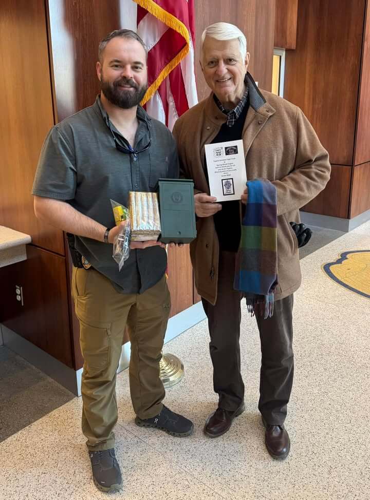 Former Tupelo Councilman Fred Pitts drops off cigars for officers' New Year celebration