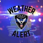 Officials urge residents to stay home as trees, power lines block roads