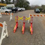Street Department places barricades at Holding Hands parking lot Street Department places barricades at Holding Hands parking lot