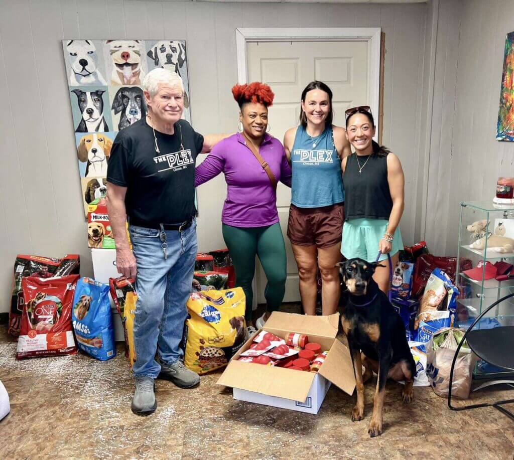 Baptist Healthplex members deliver supplies to Community Animal Rescue & Adoption