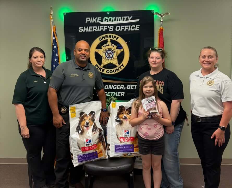 Pike County Sheriff's Office accepts dog food donation from McComb Animal Hospital