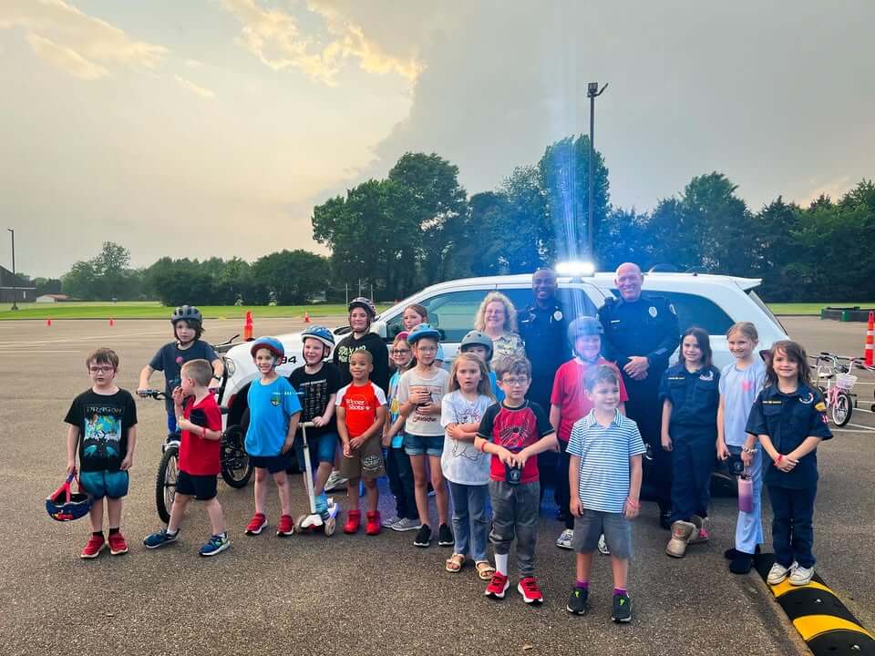 Officers promote bicycle safety at scout meeting