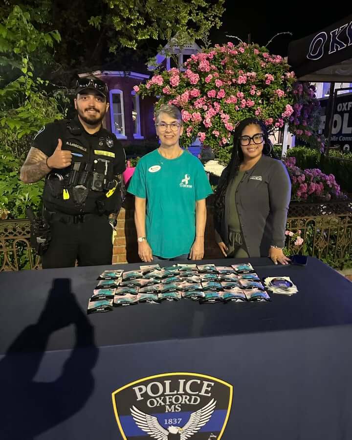 Oxford police distribute NightCap drink-spiking prevention materials at Safe Site Tent