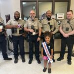 Miss Hospitality visits Rankin County deputies, presents 'Hero Hug' pins Miss Hospitality visits Rankin County deputies, presents 'Hero Hug' pins