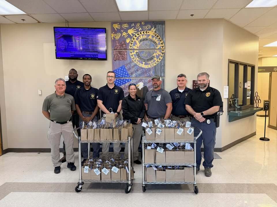 DA Bubba Bramlett gives gift bags to employees for National Police Week