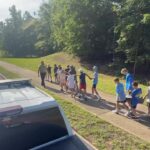 Uphill sandbag carries kick off week two of Camp C.O.P.S. Uphill sandbag carries kick off week two of Camp C.O.P.S.