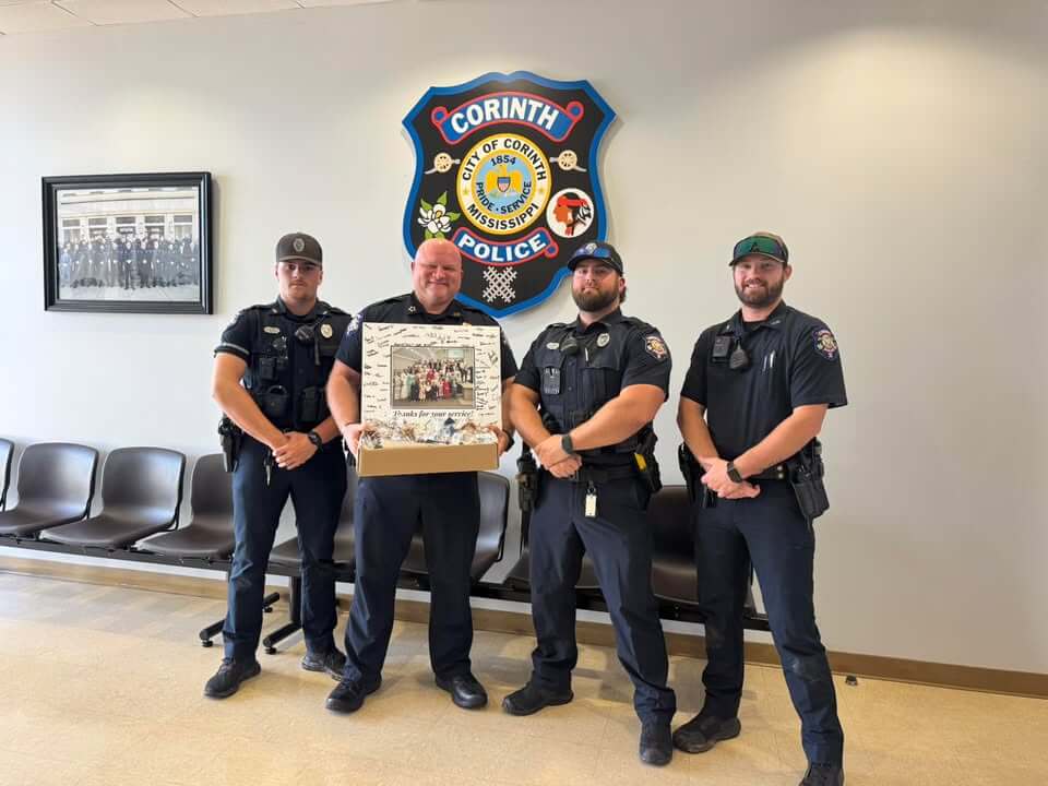 Youth group brings cookies to Corinth police to thank officers