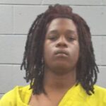 Suspects charged in shooting death of former college football player Suspects charged in shooting death of former college football player