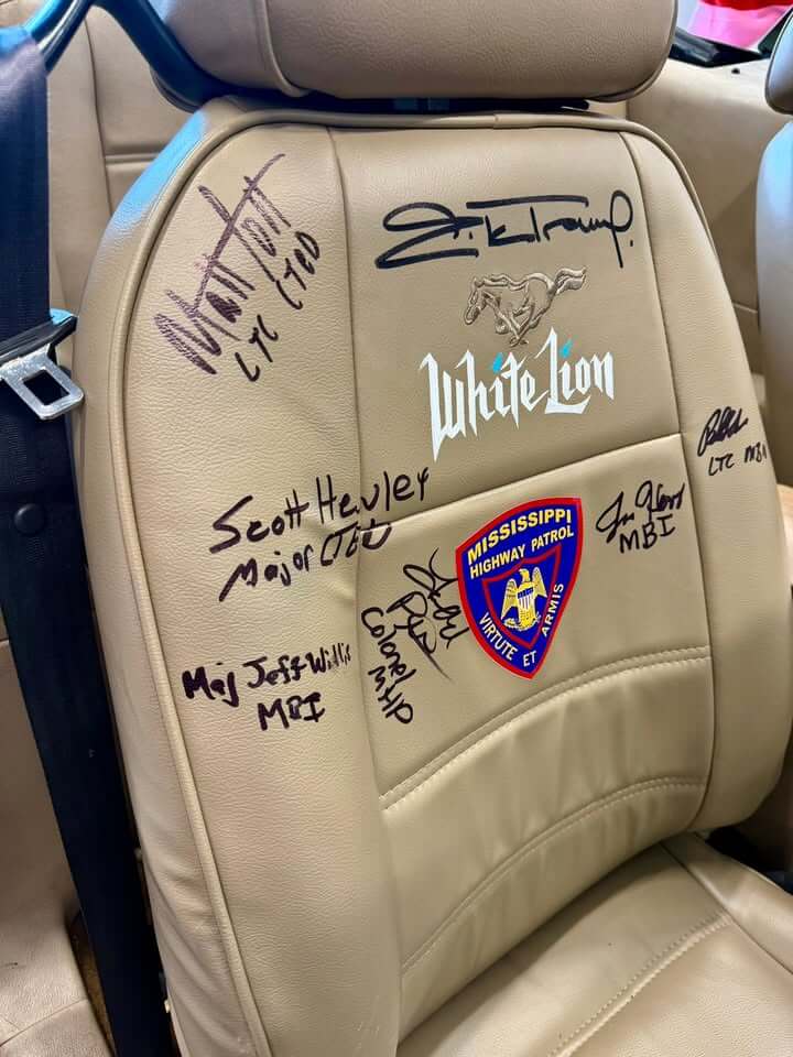 Mississippi law enforcement sign vehicle to support wounded veterans