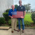 Lee County sheriff signs ESGR statement, receives flag Lee County sheriff signs ESGR statement, receives flag