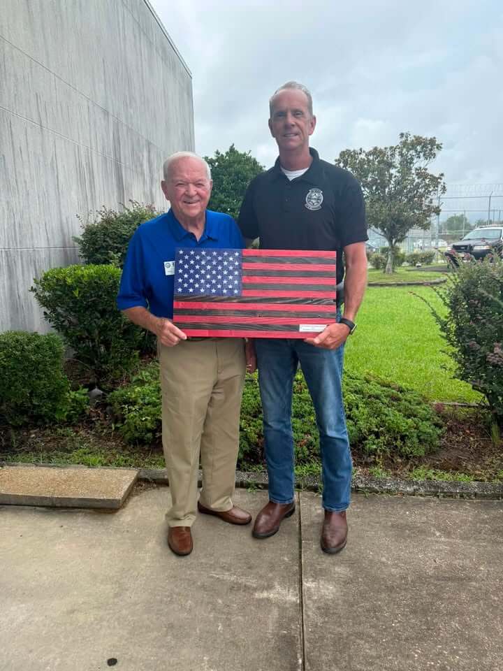 Lee County sheriff signs ESGR statement, receives flag