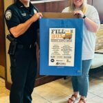 Gulfport Police collect supplies for Fill the Bus drive Gulfport Police collect supplies for Fill the Bus drive