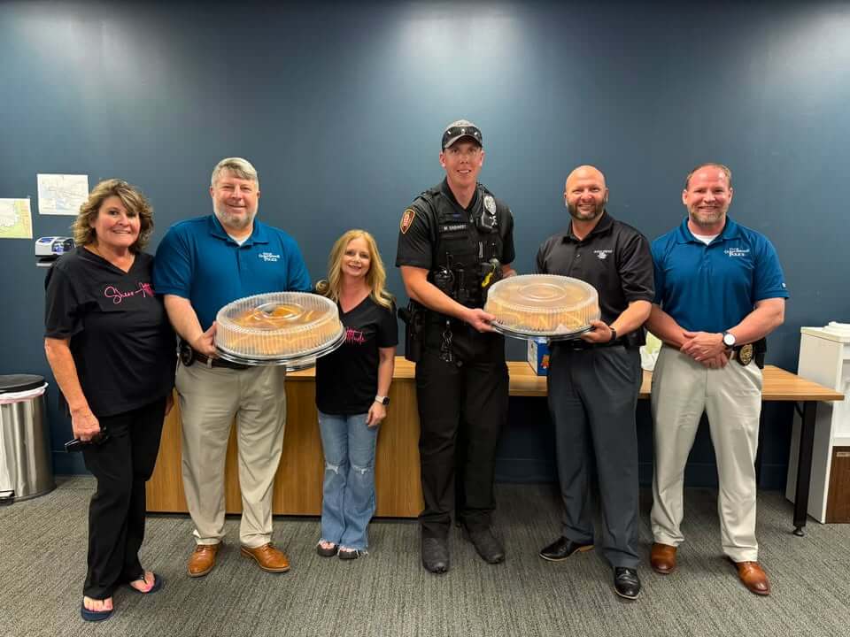 Shear Attitude treats Ocean Springs officers to lunch