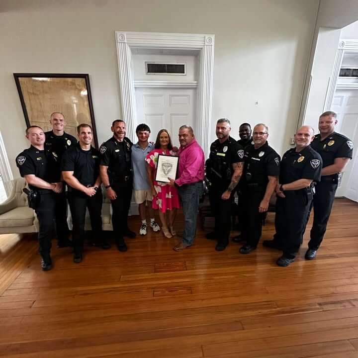 Oxford board honors Officer Johnny Sneed on retirement