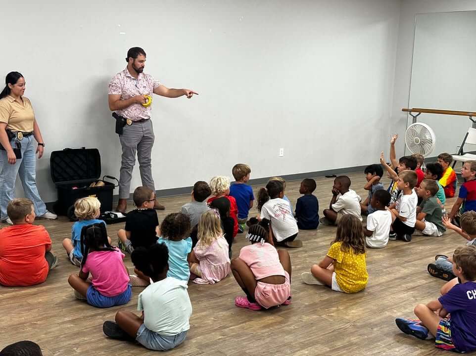 Oxford police visit OPC summer camp to demonstrate fingerprinting