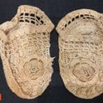 Hand-crocheted baby booties found in old home 8bf4af84233cc39ead0d32e3
