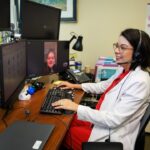 Mississippi news: UMMC telehealth renewal, heat alerts and road updates UMMC telehealth care coordinator Tiffany Regan speaks with a patient by video.